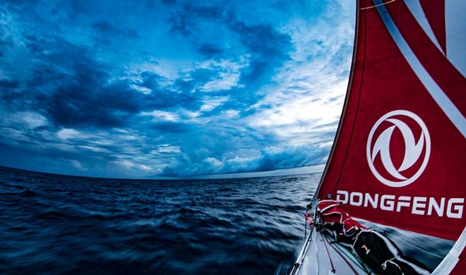 Day 7, Leg 2, Lisbon to Cape Town, sunset showers on board Dongfeng – Volvo Ocean Race ©  Jeremie Lecaudey / Volvo Ocean Race