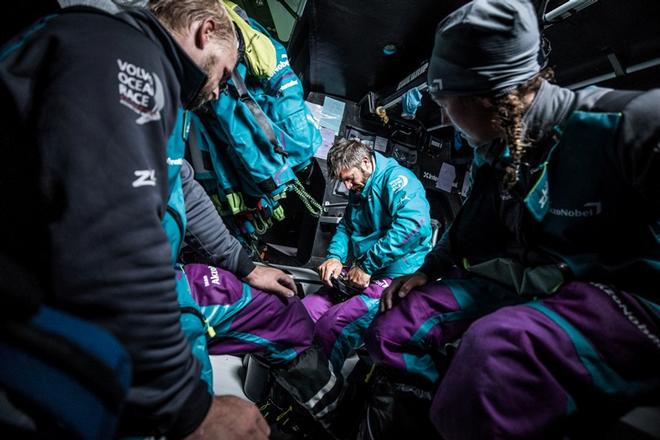 Day 17, Leg 2, Lisbon to Cape Town, on board AkzoNobel. Onlookers Brad Farrand and Emily Nagel watching Skipper Simeon Tienpont getting hands on with repairs. 21 November, 2017 – Volvo Ocean Race ©  James Blake / Volvo Ocean Race