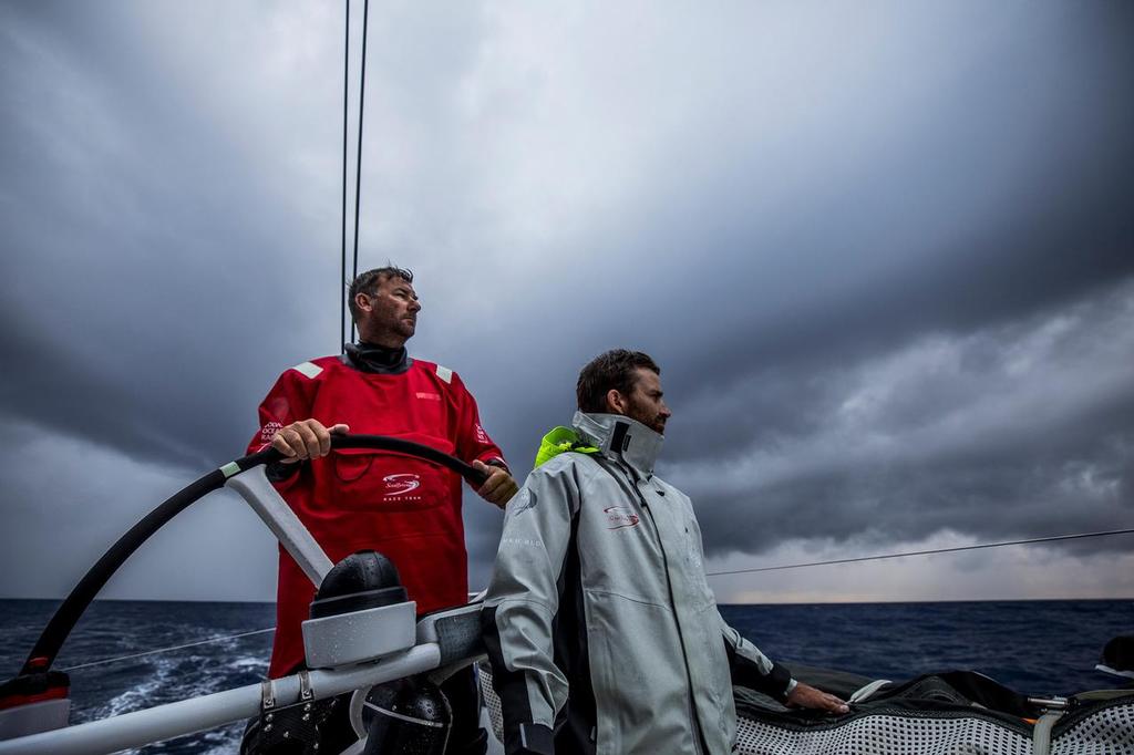 Leg 02, Lisbon to Cape Town, Day 12 David Witt and Tom Clout watching the opposition on board Sun Hung Kai/Scallywag. Volvo Ocean Race. 16 November, 2017. ©  Konrad Frost / Volvo Ocean Race