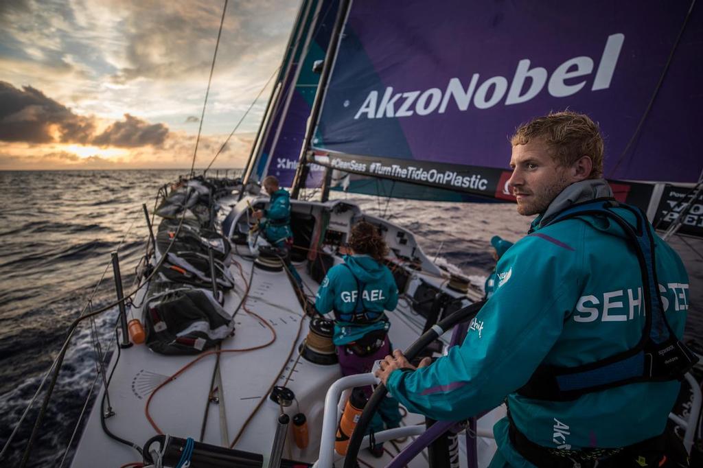 Leg 02, Lisbon to Cape Town, day 13,  on board AkzoNobel. Nicolai Sehested looking out for approaching squalls that may bring some higher winds. Any speed the team can get they will take. Volvo Ocean Race. 17 November, 2017. ©  James Blake / Volvo Ocean Race