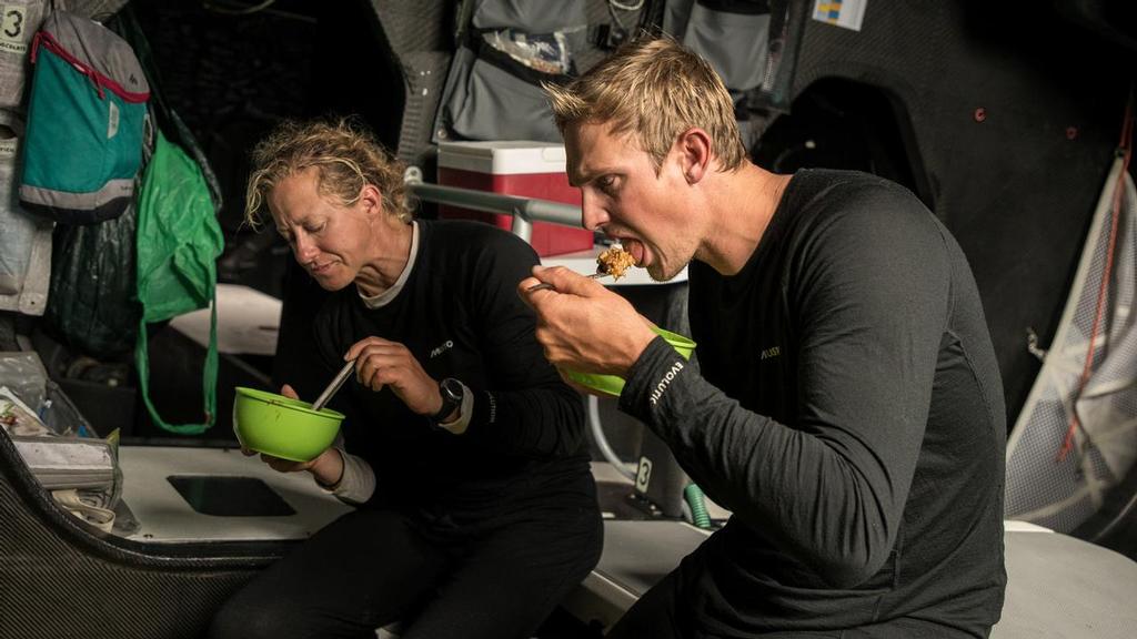 Leg 2, Day 15, Lisbon to Cape Town, Annie and Kyle grab some lunch, Photo by Rich Edwards/Volvo Ocean Race. 19 November, 2017 ©  Rich Edwards / Volvo Ocean Race