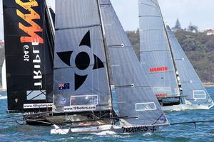 Race 7 – US visitor Harken took the early lead over Triple M and Noakes Youth – 18ft Skiffs Spring Championship photo copyright  Frank Quealey / Australian 18 Footers League taken at  and featuring the  class