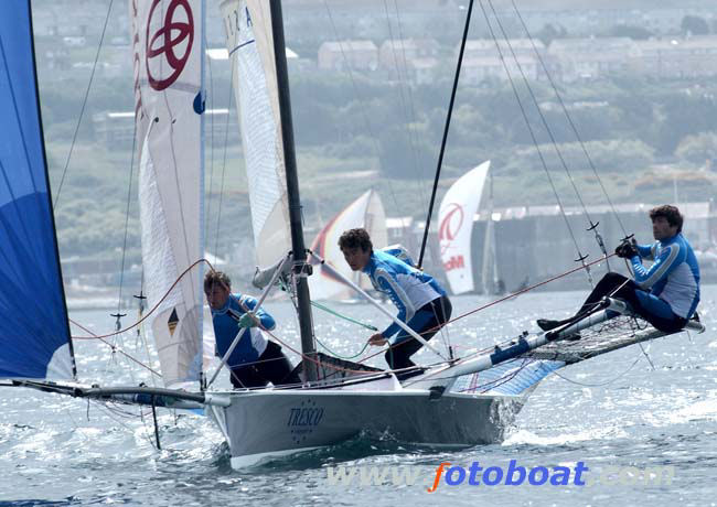 The promised sea breeze comes in on the final day of the 18ft skiff nationals at Weymouth photo copyright Steve Bell / www.fotoboat.com taken at Weymouth & Portland Sailing Academy and featuring the 18ft Skiff class