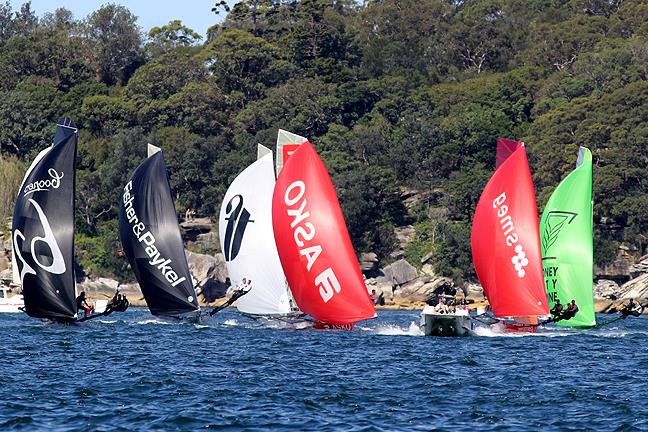 A bunched fleet on the first spinnaker run in race 7 of the 3-Buoys Challenge - photo © Frank Quealey