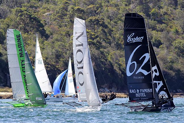 The moment Coopers 62 - Rag & Famish Hotel grabbed the lead in race 7 of the 3-Buoys Challenge photo copyright Frank Quealey taken at Australian 18 Footers League and featuring the 18ft Skiff class