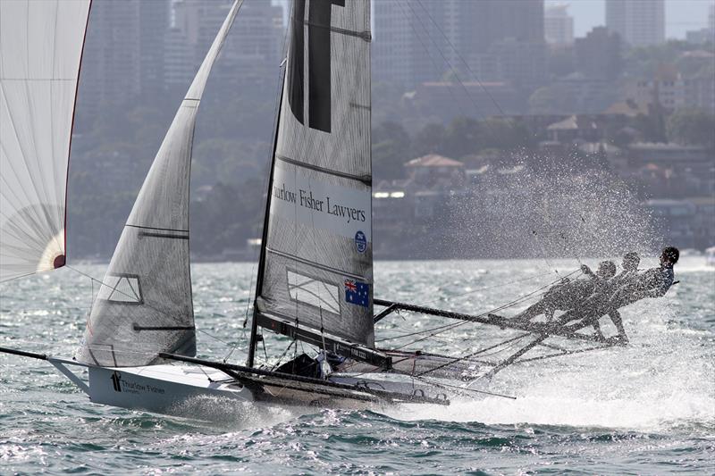 The Thurlow Fisher Lawyers crew drive their skif hardf to the finishing line off Double Bay during race 1 of the 18ft Skiff NSW Championship photo copyright Frank Quealey taken at Australian 18 Footers League and featuring the 18ft Skiff class