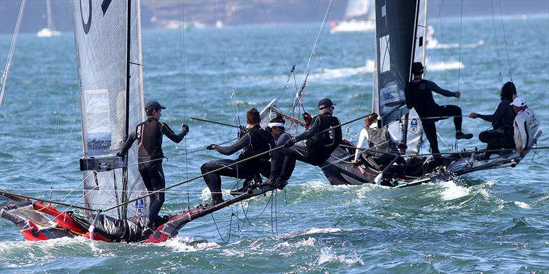 Alcatel One Touch and Triple M in close contact on the first windward leg during the 2016 Queen of the Harbour photo copyright Frank Quealey taken at Australian 18 Footers League and featuring the 18ft Skiff class