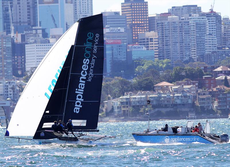 Livestream video team chase the leader down the long spinnaker run to the bottom mark in race 6 of the 18ft Skiff Spring Championship on Sydney Harbour photo copyright Frank Quealey taken at Australian 18 Footers League and featuring the 18ft Skiff class