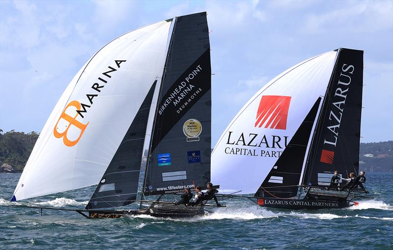 Birkenhead Point Marina leads Lazarus Capital Partners on the run to the bottom mark during race 1 of the 100th 18ft Skiff Australian Championship photo copyright Michael Chittenden taken at Australian 18 Footers League and featuring the 18ft Skiff class