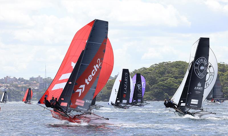 Defending champion Tech2 back in the fleet on the spinnaker run to Robertson Point during race 1 of the 100th 18ft Skiff Australian Championship photo copyright Michael Chittenden taken at Australian 18 Footers League and featuring the 18ft Skiff class