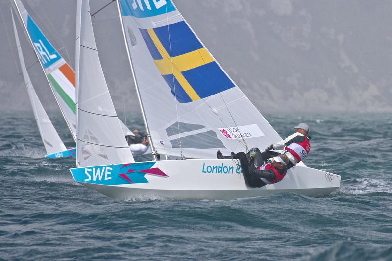 Freddie Loof and Max Salminen (SWE) on their way to winning the Star class Gold medal the 2012 Olympics. Loof a winner of three Olympic medals placed second in the 2019 Symonite OK Worlds - photo © Richard Gladwell