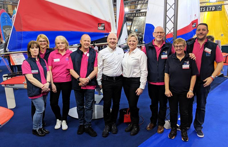 The Topper team at the RYA Dinghy Show together with Glen & Karen Wallis of GJW Direct photo copyright Mark Jardine taken at RYA Dinghy Show and featuring the Topper class