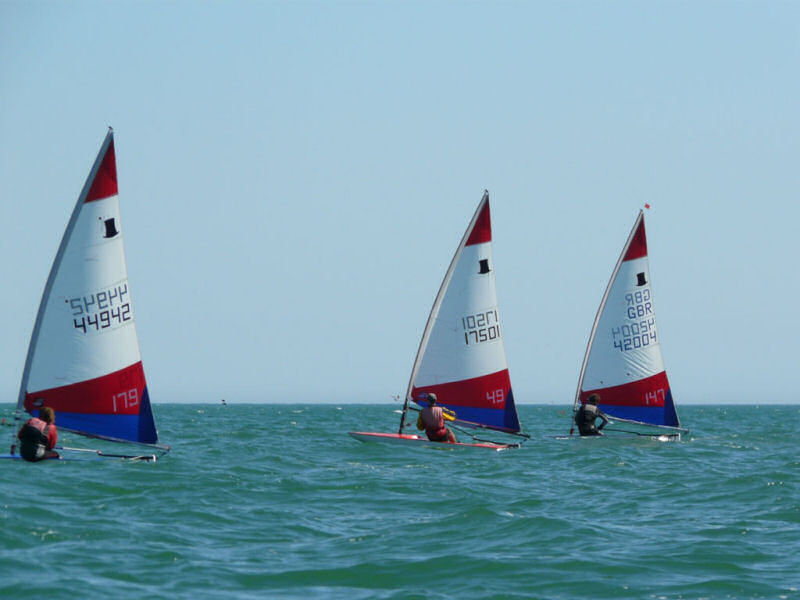 Brilliant sunshine and fresh winds for the 23 Toppers at Lancing photo copyright Gary Austin taken at Lancing Sailing Club and featuring the Topper class