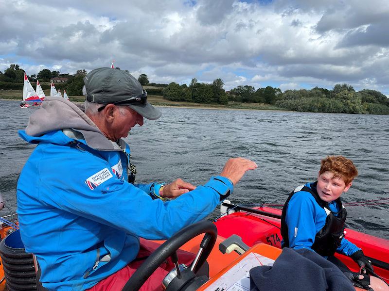 Coach Steve Irish explaining in detail the technique to one of the Topper Sailors during the ITCA (GBR) Invitatonal Training at Draycote Water - photo © Mike Powell