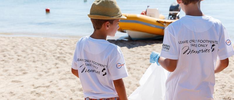Beach clean-up during the 52 SUPER SERIES Audi Sailing Week at Porto Cervo photo copyright Nico Martinez / www.MartinezStudio.es taken at Yacht Club Costa Smeralda and featuring the TP52 class