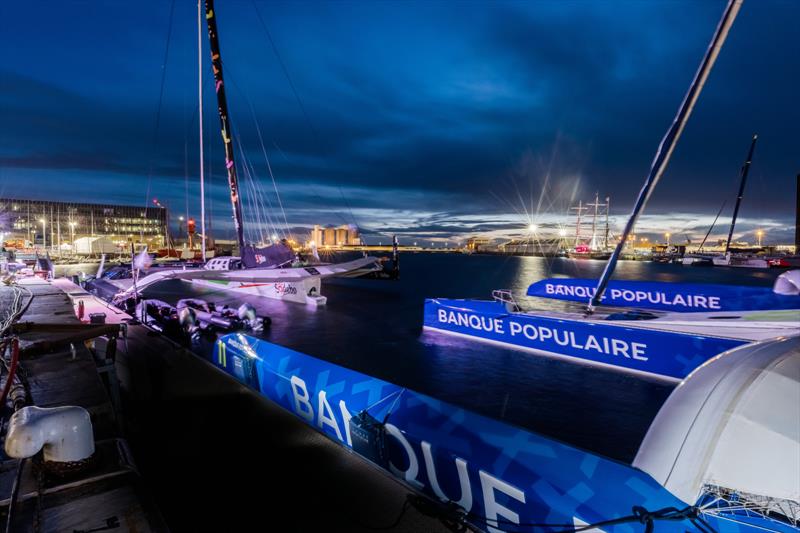 The Ultimes boats are illustrated at night in the village during prestart of the Transat Jacques Vabre in Le Havre, France photo copyright Jean-Marie Liot / Alea / TJV21 taken at  and featuring the Trimaran class