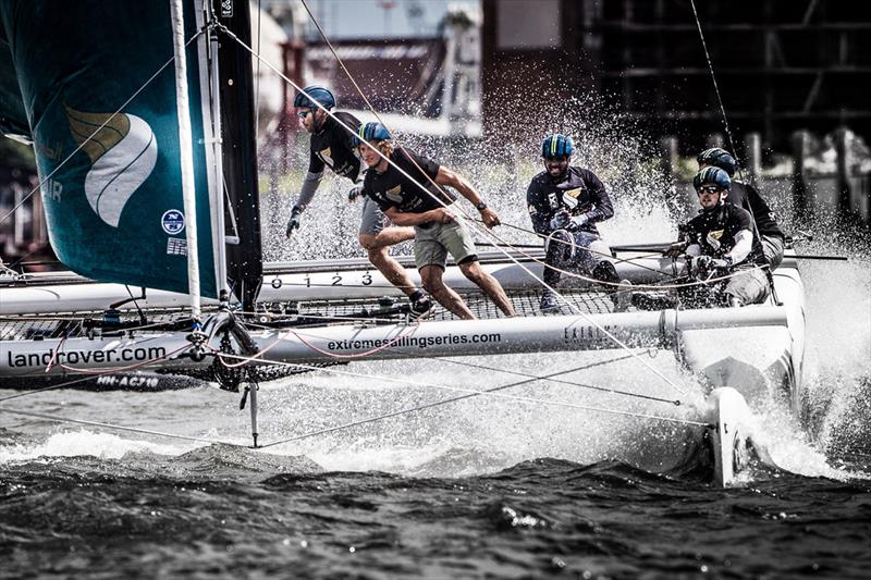 The crew onboard Oman Air pushing hard on day 3 of Extreme Sailing Series Act 5, Hamburg photo copyright Jesus Renedo / OC Sport taken at  and featuring the Extreme 40 class