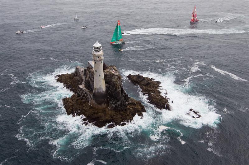Groupama and CAMPER with Emirates Team New Zealand rounding the Fastnet Rock in 2012 photo copyright Ian Roman / Volvo Ocean Race taken at Royal Ocean Racing Club and featuring the Volvo 70 class