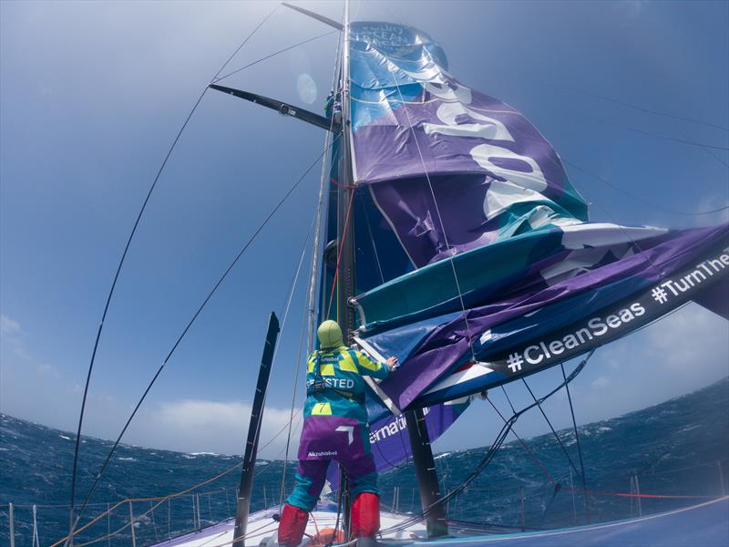 AkzoNobel crew climb the damaged mast after suffering a sail track issue - now under repair 14 December, 2017 - photo © James Blake / Volvo Ocean Race