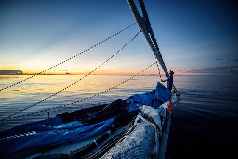 Leg 4, Melbourne to Hong Kong, day 08, Nick Dana swaps sails on the bow during a sailchange to determine how best to harness a windless Doldrums night on board Vestas 11th Hour photo copyright Amory Ross / Volvo Ocean Race taken at  and featuring the Volvo One-Design class