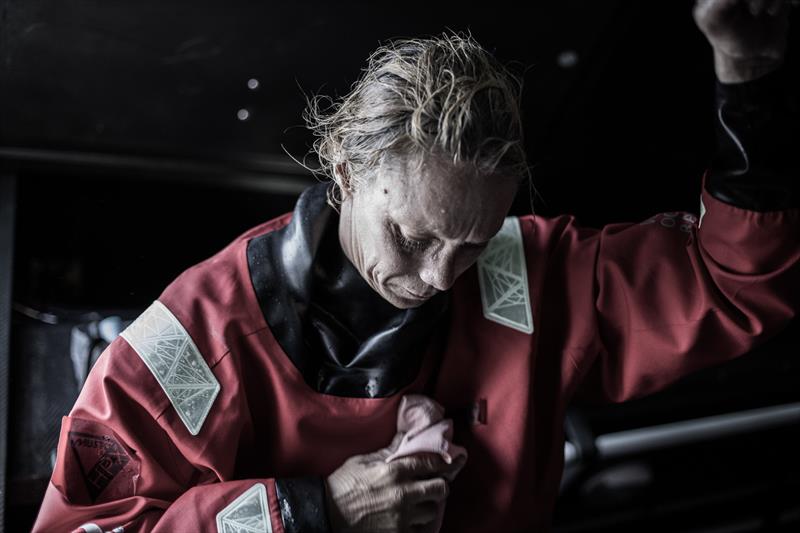 Leg 4, Melbourne to Hong Kong, day 14 Annemeike Bes using a towel to dry herself after a wet watch on deck on board Sun Hung Kai / Scallywag photo copyright Konrad Frost / Volvo Ocean Race. 15 January taken at  and featuring the Volvo One-Design class