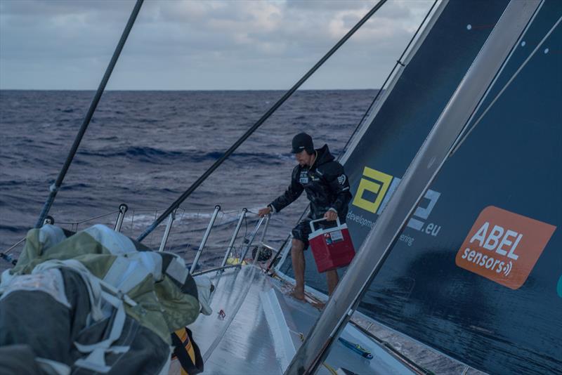 Leg 6 to Auckland, day 19 on board Brunel. 24 February, . Dishwashing at the bow for bowman Carlo Huisman photo copyright Yann Riou / Volvo Ocean Race taken at  and featuring the Volvo One-Design class