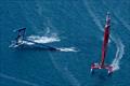 USA SailGP Team helmed by Taylor Canfield capsizes as Emirates Great Britain SailGP Team helmed by Giles Scott passes by during a practice session ahead of the Apex Group Bermuda Sail Grand Prix in Bermuda.May 3, 2024