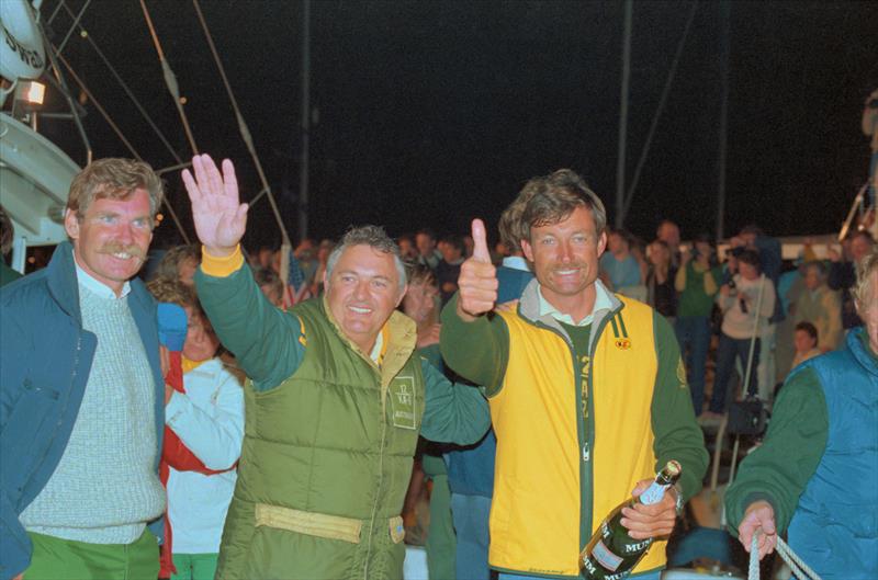 Alan Bond and John Bertrand of Australia, wave and give `thumbs-up` sign after defeating the United States in the 1983 America's Cup  - photo © Bettmann Archive
