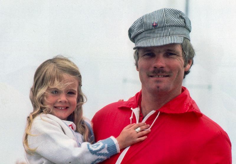 Ted Turner on Mariner with his then 5yr old daughter, Jane. He is wearing his train engineer's hat which became a mild fashion trend at the time. 1974 photo copyright Paul A. Darling taken at  and featuring the 12m class
