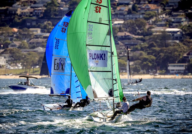 13' Skiff Plonk Café representing Middle Harbour Skiffs photo copyright SailMedia taken at Manly 16ft Skiff Sailing Club and featuring the 13ft Skiff class
