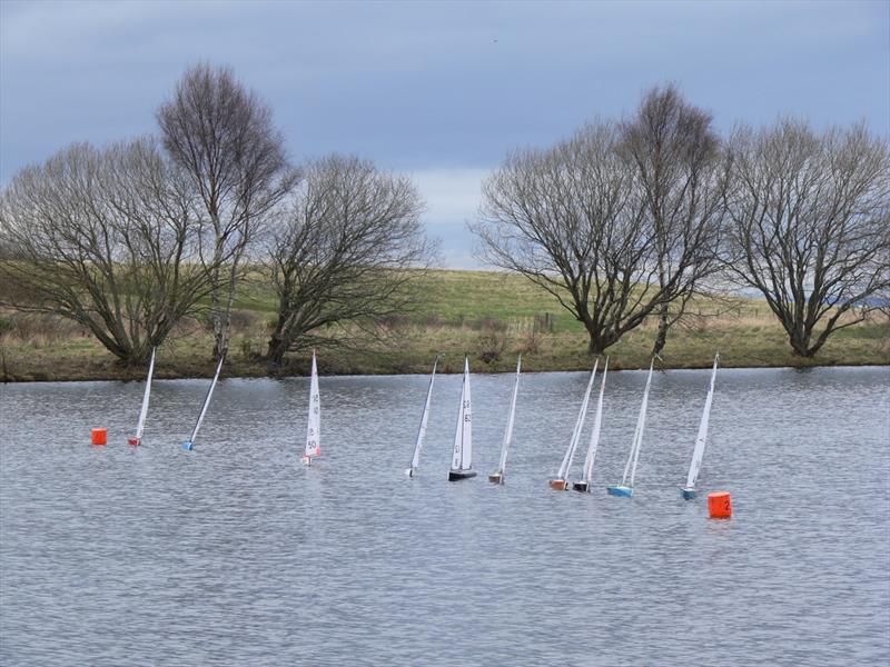 Startline during the Scottish District IOM Travellers at Levenhall photo copyright Ian Dunda taken at Levenhall Radio Yacht Club and featuring the One Metre class