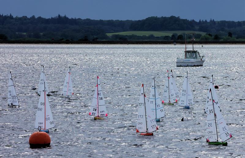 2026 IOM Worlds at Datchet Water Day 1 - A moody evening sky as the fleet sails downwind - photo © Mark Jardine