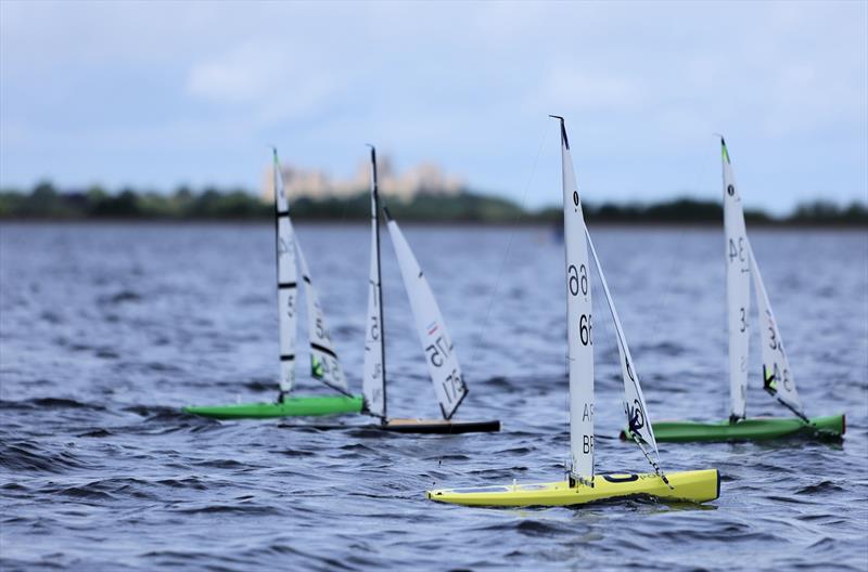2026 IOM Worlds at Datchet Water Day 3 - USA 54, JPN 175, BRA 66, MAS 34 downwind with Windsor Castle in the background - photo © Mark Jardine