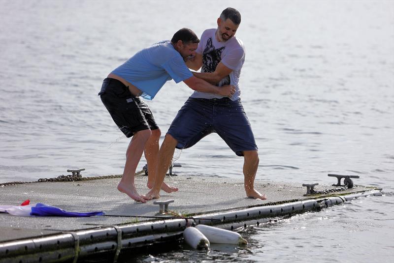 The winners celebrating with a dunk at the 2026 IOM Worlds - Alexis and Zvonko photo copyright Mark Jardine taken at Datchet Water Sailing Club and featuring the One Metre class