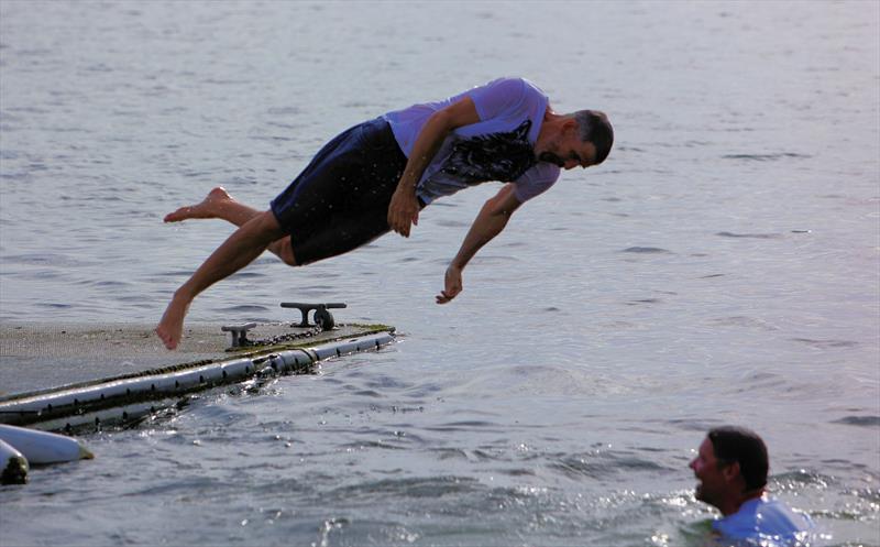 The winners celebrating with a dunk at the 2026 IOM Worlds - Alexis and Zvonko photo copyright Mark Jardine taken at Datchet Water Sailing Club and featuring the One Metre class
