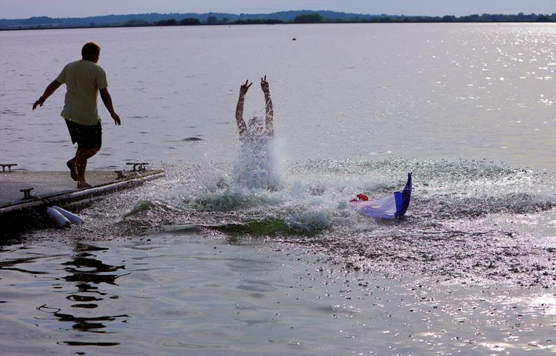 The winners celebrating with a dunk at the 2026 IOM Worlds - Alexis, Zvonko and Rob photo copyright Mark Jardine taken at Datchet Water Sailing Club and featuring the One Metre class