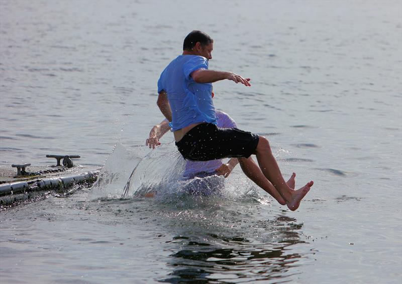 The winners celebrating with a dunk at the 2026 IOM Worlds - Alexis and Zvonko photo copyright Mark Jardine taken at Datchet Water Sailing Club and featuring the One Metre class