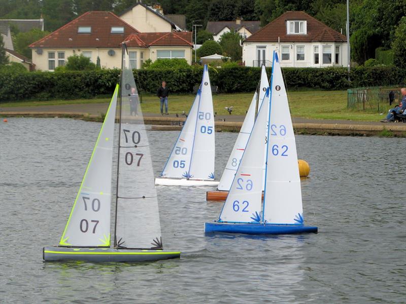 The Fleet in Motion during the 2026 MYA Scottish District IOM Travellers 2 at Paisley Model Yacht Club photo copyright David Smith taken at Paisley Model Yacht Club and featuring the One Metre class