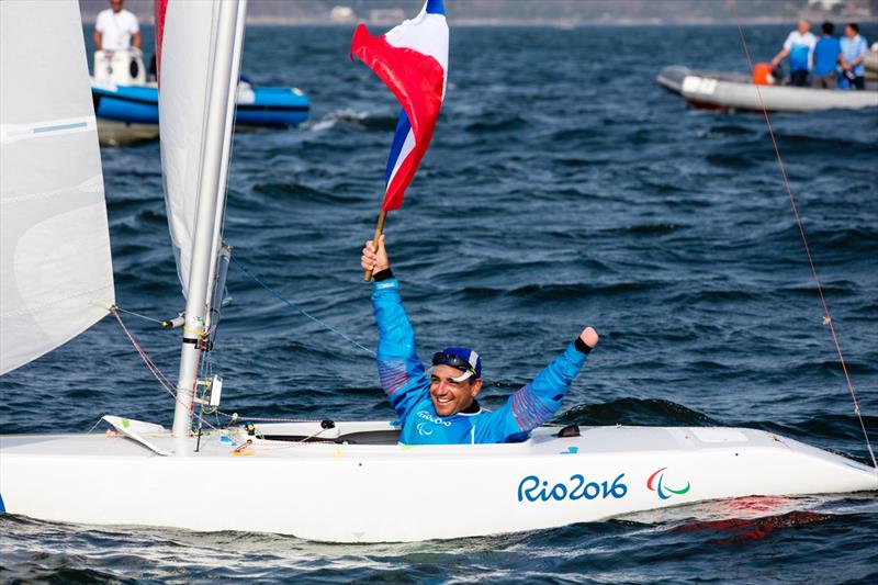 Seguin celebrates gold at the Rio 2016 Paralympic Sailing Competition photo copyright Richard Langdon / Ocean Images taken at  and featuring the 2.4m class