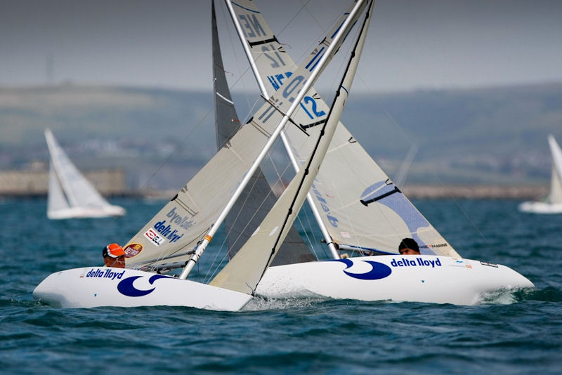 Netherland’s Andre Rademaker (NED-11) and Thierry Schmitter (NED-12) on day five of the IFDS Disabled Sailing Worlds photo copyright Paul Wyeth / www.pwpictures.com taken at Weymouth & Portland Sailing Academy and featuring the 2.4m class