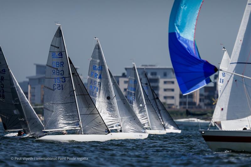 2.4mR fleet on Monday at the International Paint Poole Regatta 2026 photo copyright Paul Wyeth / www.pwpictures.com taken at Parkstone Yacht Club and featuring the 2.4m class
