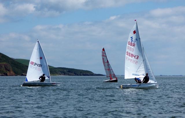 Close racing out in the bay on opposite tacks; Emily Biggar and Megan Patterson leading at Solway Yacht Club Cadet Week photo copyright Ian Purkis taken at Solway Yacht Club and featuring the 420 class