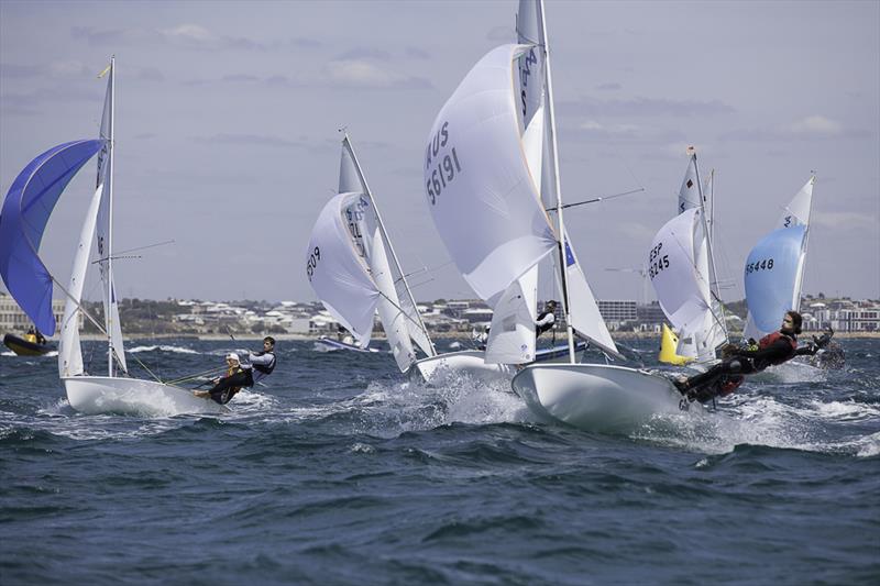 Heavy traffic at the final turn mark before the finish on day 3 of the 420 Australian Nationals at Fremantle photo copyright Bernie Kaaks taken at Fremantle Sailing Club and featuring the 420 class