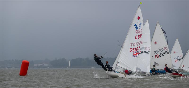 Hectic action at the first mark, Abbey Mumford/Evie Herrington (55107) will be forced to take the long way round during the KSSA Mid-Summer Regatta at Medway photo copyright Jon Bentman taken at Medway Yacht Club and featuring the 420 class