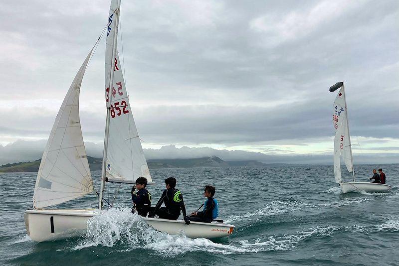 Strong wind youth training at Lyme Regis photo copyright Jim T taken at Lyme Regis Sailing Club and featuring the 420 class