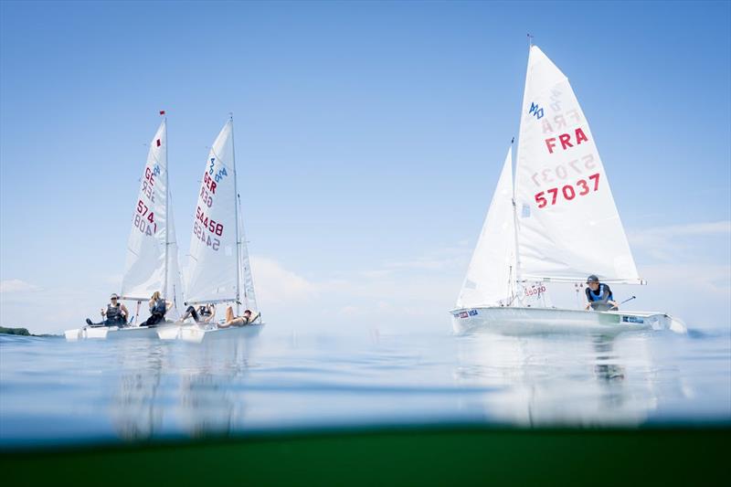 Not enough wind, no racing, but sunbathing also for the 420 fleet on day 1 at Kiel Week photo copyright Kieler Woche / Sascha Klahn taken at Kieler Yacht Club and featuring the 420 class