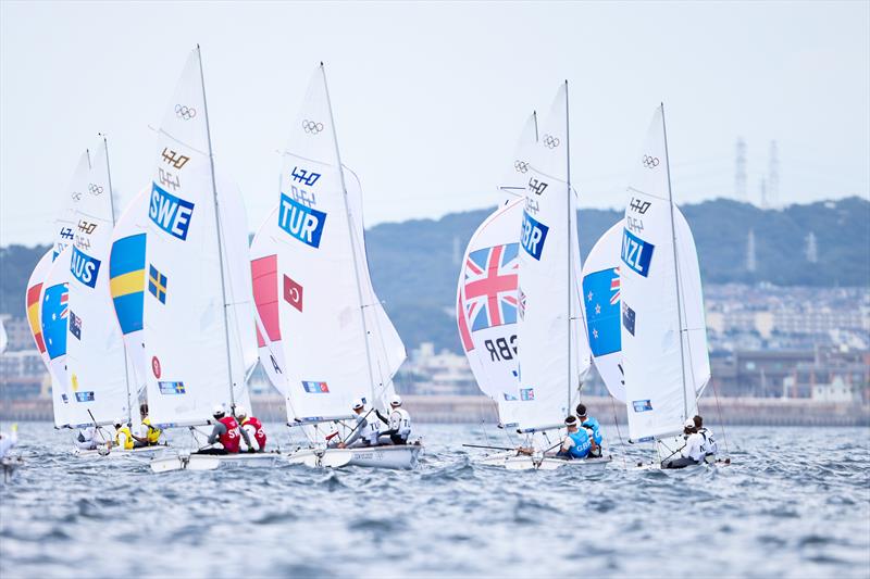 Men's 470 fleet on Tokyo 2020 Olympic Sailing Competition Day 6 photo copyright Sailing Energy / World Sailing taken at  and featuring the 470 class
