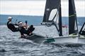 Tom Burton and Simon Hoffman (Nacra 17) competing at 49er, 49erFX & Nacra 17 World Championships in Hubbards, NS, Canada © Beau Outteridge