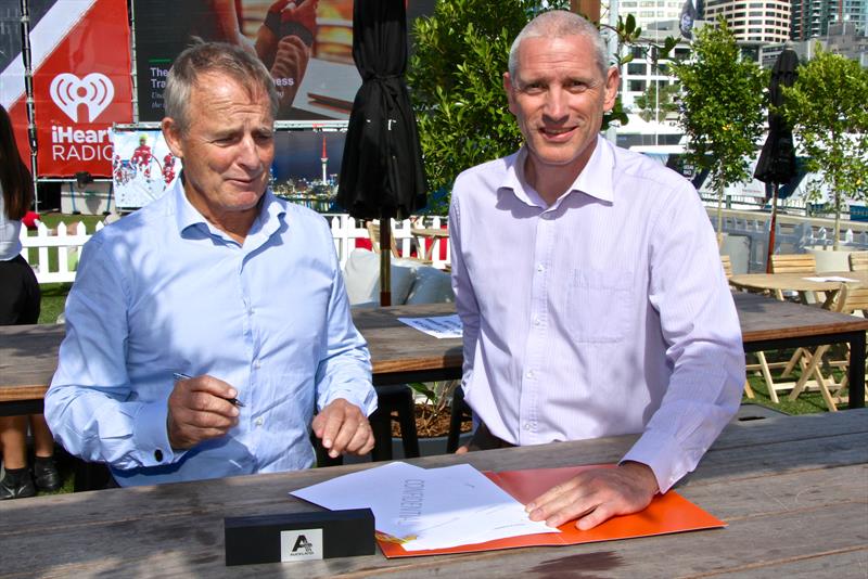 David Abercrombie and Stuart Turner sign the World Championship agreement photo copyright Richard Gladwell taken at Yachting New Zealand and featuring the 49er class