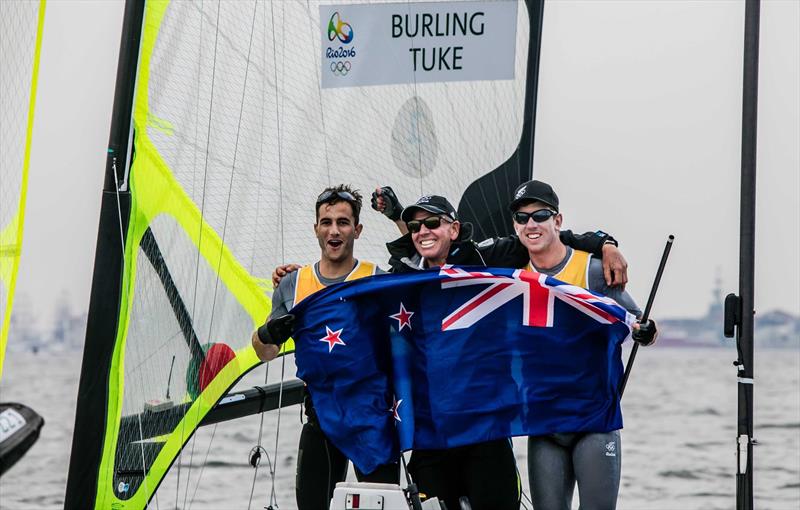 Blair Tuke, Hamish Willcox and Peter Burling celebrate their Gold Medal win after the penultimate race in the 49er at the Rio Olympic Regatta photo copyright Emirates Team New Zealand taken at Iate Clube do Rio de Janeiro and featuring the 49er class